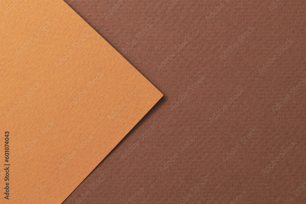 Fototapeta premium Rough kraft paper background, paper texture different shades of brown. Mockup with copy space for text