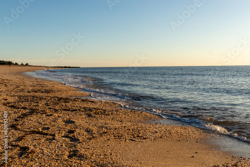 This picture was taken at Sunset beach in Cape May New Jersey. The color of the sand seems to glow orange in this image. The beautiful ocean and the waves crashing into the shore.