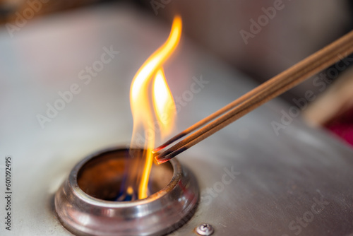 Burning incense over the gas stove
