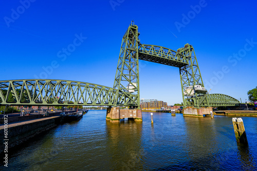 Koningshavenbrug   King s Haven Bridge   is an industrial-style railway bridge across the Nieuwe Maas in Rotterdam  the Netherlands. The central part of this bridge is raised thanks to a pulley system