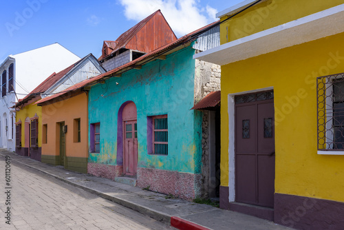 Colorful colonial architecture of historic center of Flores, Guatemala.