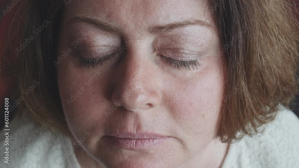 Portrait of a middle-aged woman with big gray eyes Portrait of a middle-aged woman with big gray eyes