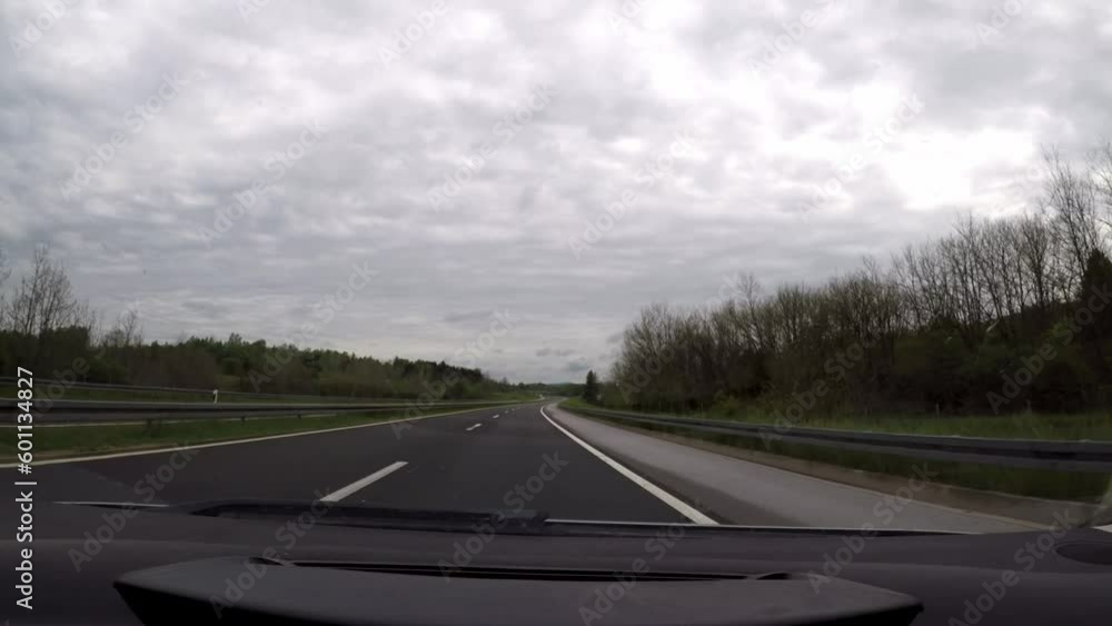 driving a car on the highway, view from the car, cloudy, spring
driving a car on the highway, view from the car, cloudy, spring