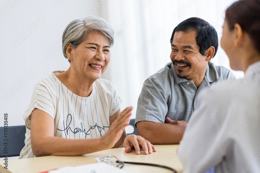 Asian seniors who are healthy, in a good mood, smiling, talking with financial or life insurance staff to take care of life after retirement. Asian seniors who are healthy, in a good mood, smiling, talking with financial or life insurance staff to take care of life after retirement.