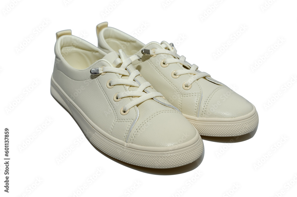 White unisex sneakers with white laces. Modern comfortable shoes. White unisex sneakers with white laces. Modern comfortable shoes.