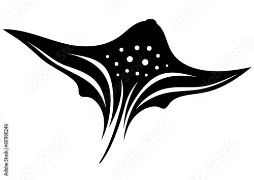 Silhouette of a swimming manta ray in the ocean
