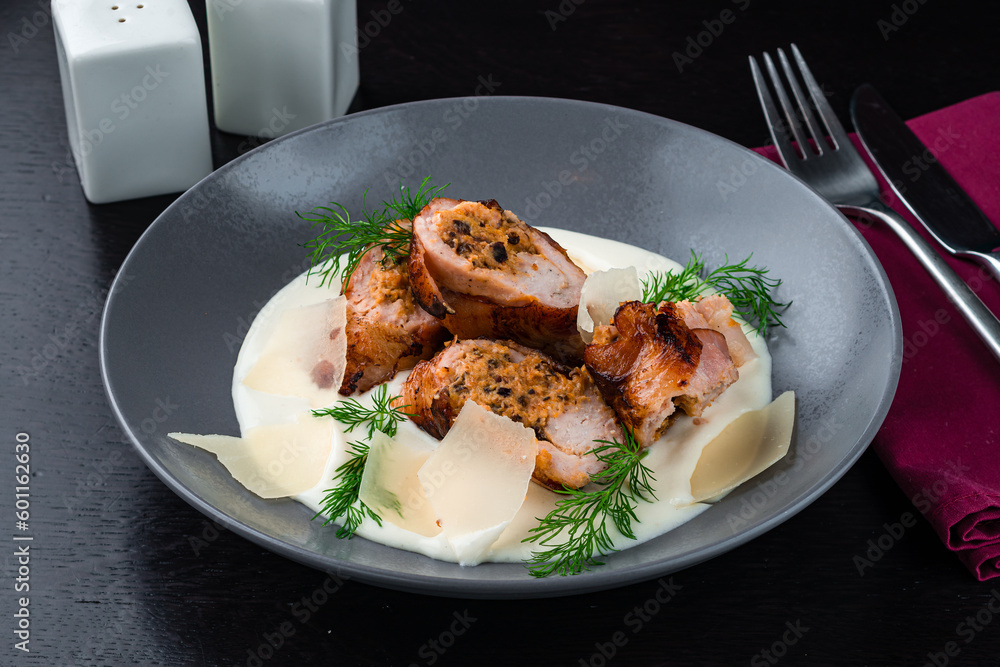 Meat rolls with cheese and mushrooms, creamy sauce, parmesan and herbs. Meat rolls with cheese and mushrooms, creamy sauce, parmesan and herbs.