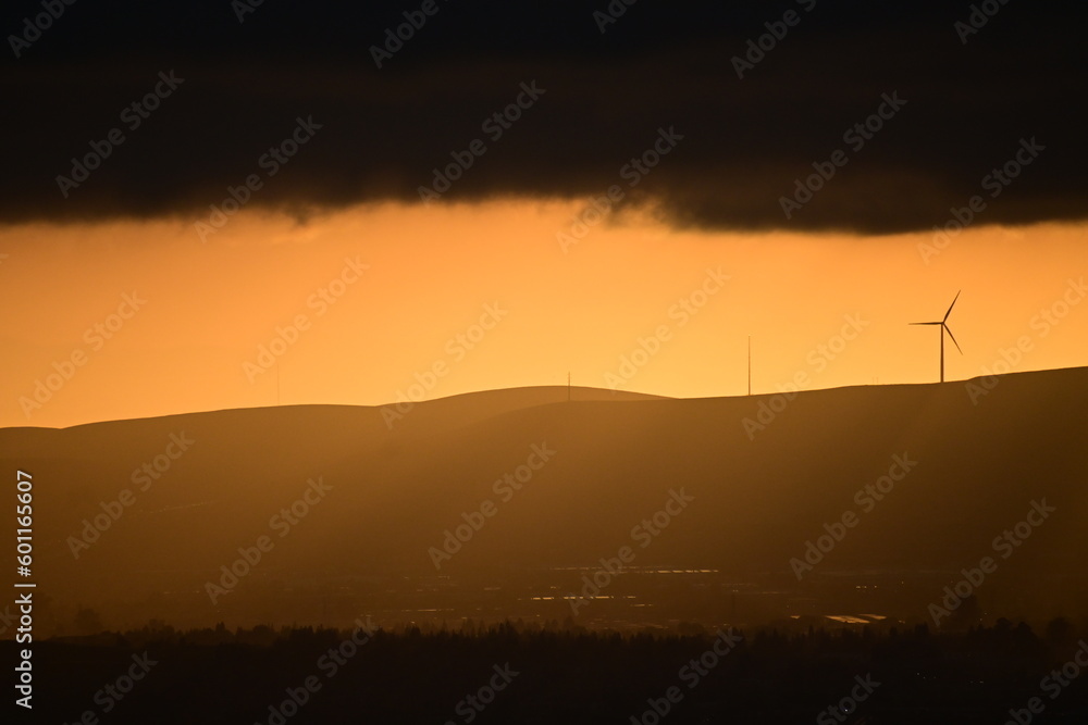 Fototapeta premium wind turbines at sunset
