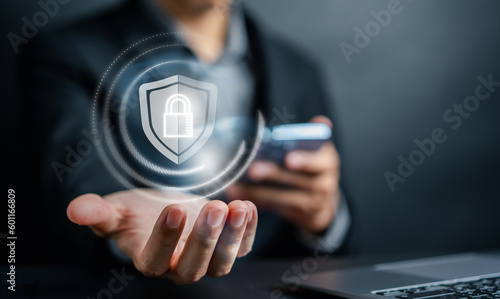 Cybersecurity and privacy concepts to protect data. businessman with internet network security technology. Businessman locking personal data on smartphone. cyber security concept.