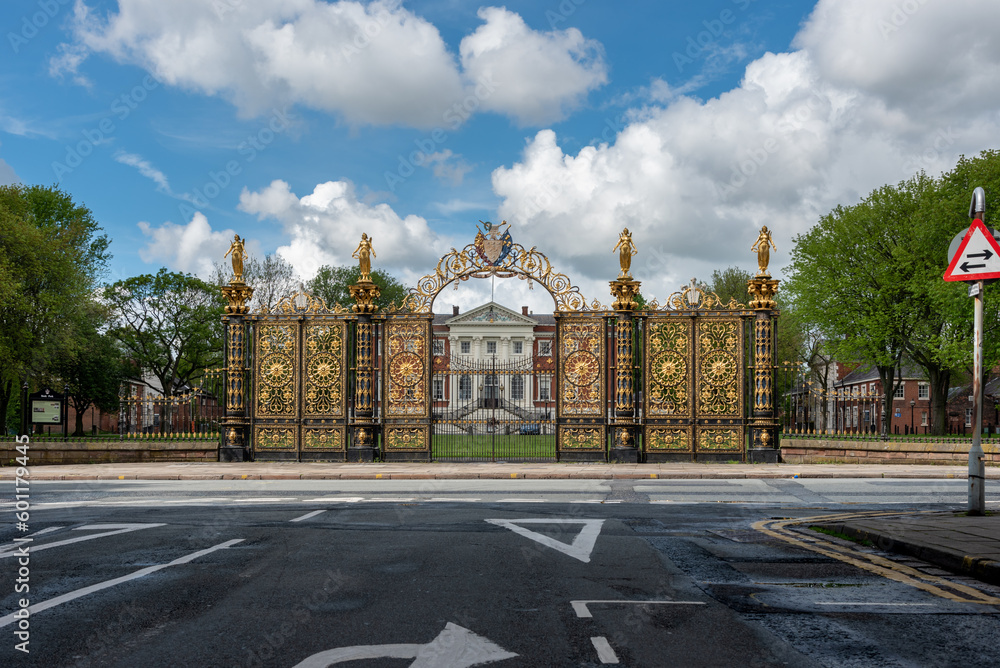 Facade view of Warrington Town Hall originally called Bank Hall, Cheshire, cast iron park gates