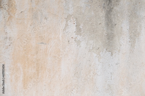 Concrete wall texture with cracks and scratches. Yellow and grey graphic materials 