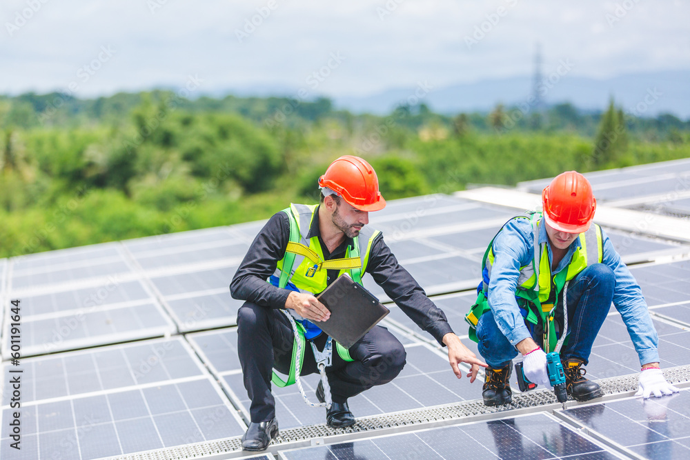 custom made wallpaper toronto digitalTechnician engineer service meeting and checking solar cell on rooftop of industrial factory. Inspection worker repair solar cell panels. Clean Renewable energy, Ecology and alternative power concept