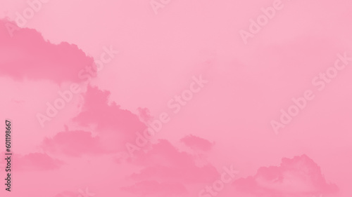 Pink clouds on light pink sky background, pastel sky