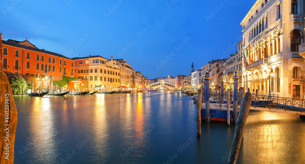 Amazing night cityscape of Venice with famous Canal Grande and Rialto Bridge