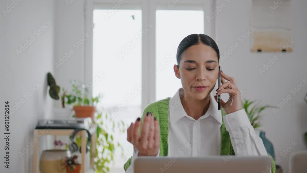 Emotional girl calling phone at room closeup. Nervous woman talking smartphone Emotional girl calling phone at room closeup. Nervous woman talking smartphone