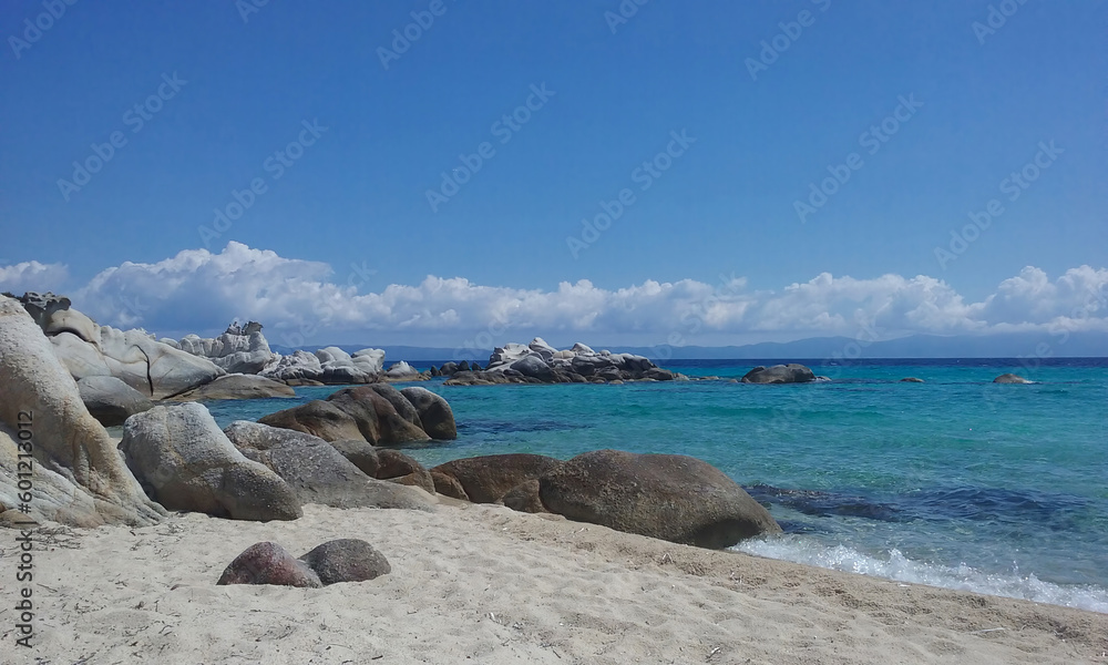 Turquoise sea water meeting rocky seashore at Sithonia peninsula