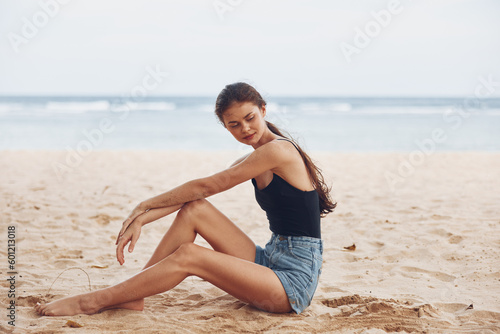 woman freedom sand nature travel smile sea vacation person beach sitting