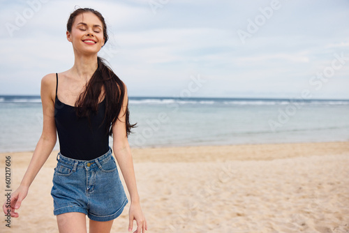 woman long running sunset young beach summer smile hair sea lifestyle travel