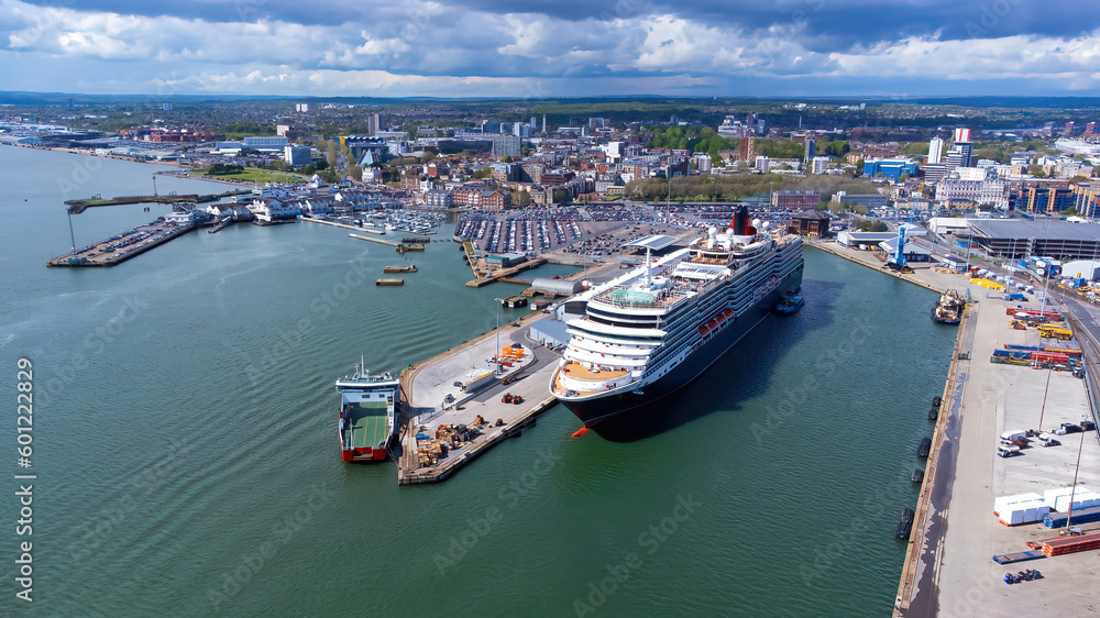 Queen Victoria cruise ship moored in the Port of Southampton on the Channel coast in southern England, United Kingdom - This is a Vista Class vessel that is used for luxury travel