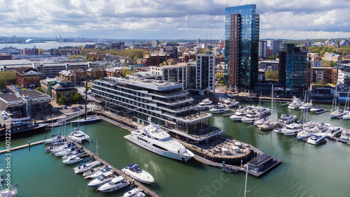 Ocean Village Marina is a redevelopped neighborhood of Southampton on the Channel coast in southern England  UK. It has a residential tower and a luxury hotel that mimics the shape of a cruise ship.