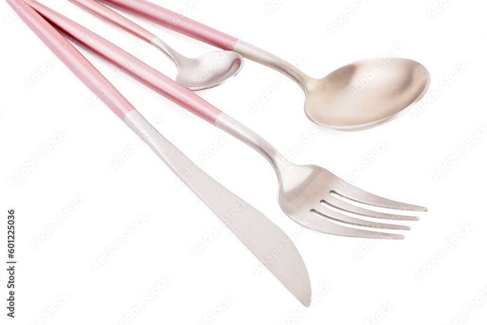 Stainless steel set of cutlery with pink handles on white background Stainless steel set of cutlery with pink handles on white background