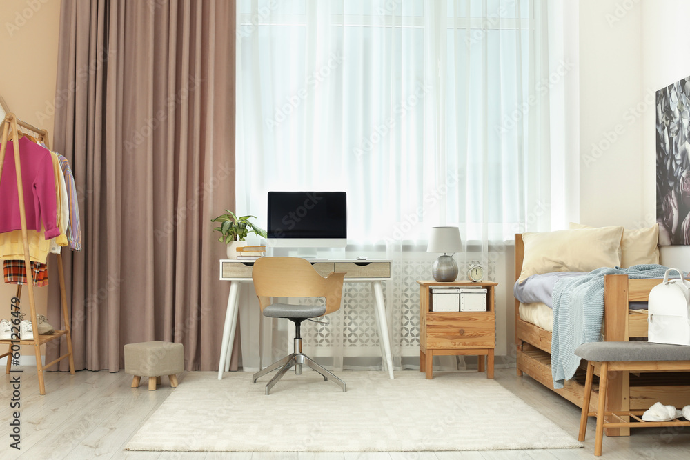 Stylish teenager's room interior with computer and comfortable bed Stylish teenager's room interior with computer and comfortable bed
