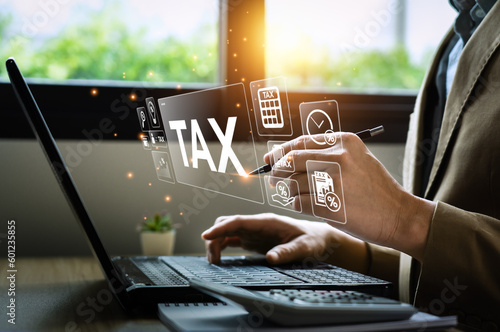 Tax payment and tax deduction planning involve strategies to minimize tax liability. This includes maximizing deductions and credits, deferring income, and accelerating deductions. tax professional photo