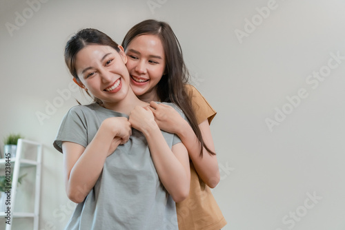 Happy asian girl couple cheerful. Homosexual couple hugging each other in love. LGBT Lesbian couple love.