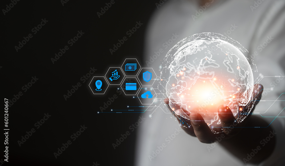 Φωτογραφία The businessman hand a hologram of the globe with icons of personal data