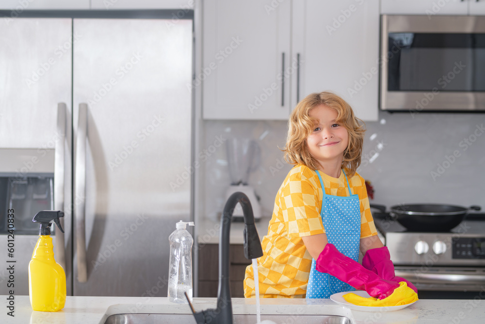 Housekeeping, home chores. Child helping with household, wiping dishes