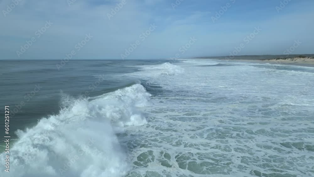 Flying Over The Ocean With Breaking Waves In Nazare, Portugal. - aerial pullback Flying Over The Ocean With Breaking Waves In Nazare, Portugal. - aerial pullback