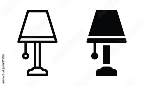 Lamp icon with outline and glyph style.