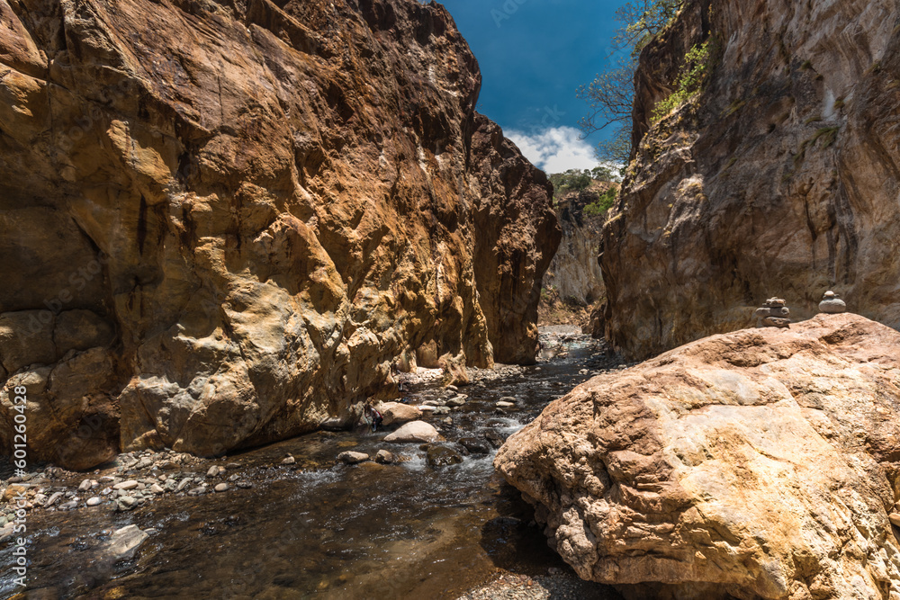 landscape of a rocky canyon and the riverbed on a hot sunny day in the province of Puntarenas in Costa Rica
