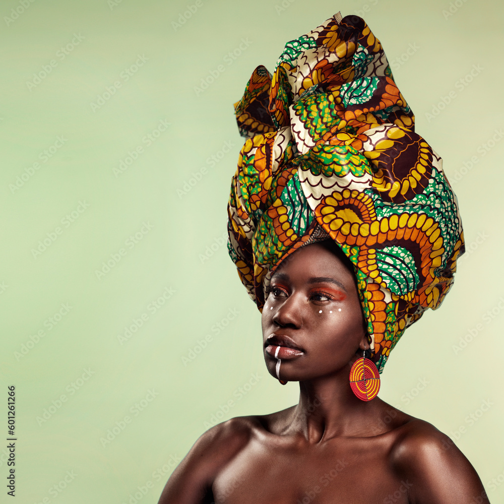 Beauty, black woman and cosmetics with African turban and makeup with mockup. Isolated, green background and young female person thinking with a traditional hair scarf with confidence and culture Beauty, black woman and cosmetics with African turban and makeup with mockup. Isolated, green background and young female person thinking with a traditional hair scarf with confidence and culture