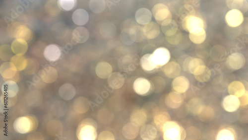 Bokeh light background with brown, yellow and warm earth tones from sea rock compositions.