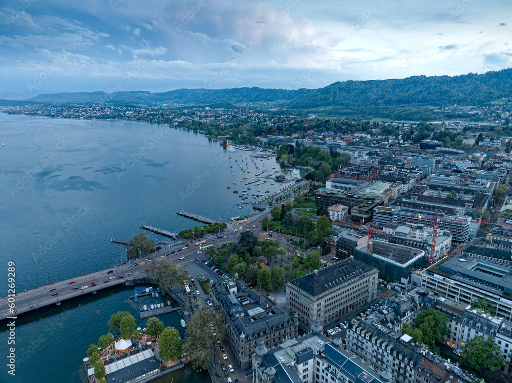 Aerial view over Swiss City of Zürich with Lake Zurich in the background on a beautiful spring evening with colorful dramatic sky. Photo taken May 6th, 2023, Zurich, Switzerland.