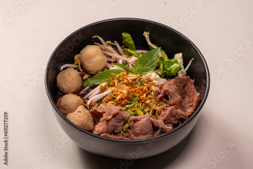 Thai noodle with pork is a street food that is commonly sold in Thailand. Also known as 
