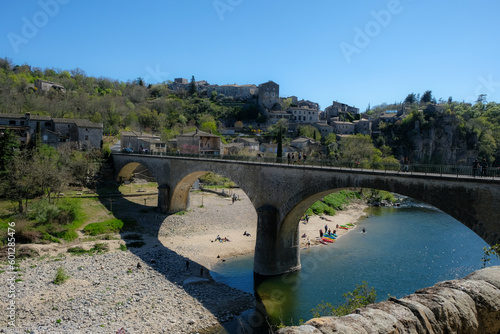 April 08, 2023. Balazuc, Ardèche department, France. The bridge on the Ardèche. Canoe kayaking tourism.