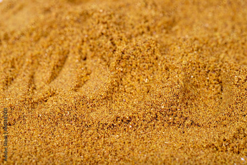 Pile of cumin powder as background, spice or seasoning as background. Ground or sifted garam masala. Cumin powder. Indian spice Pile of cumin powder as background, spice or seasoning as background. Ground or sifted garam masala. Cumin powder. Indian spice