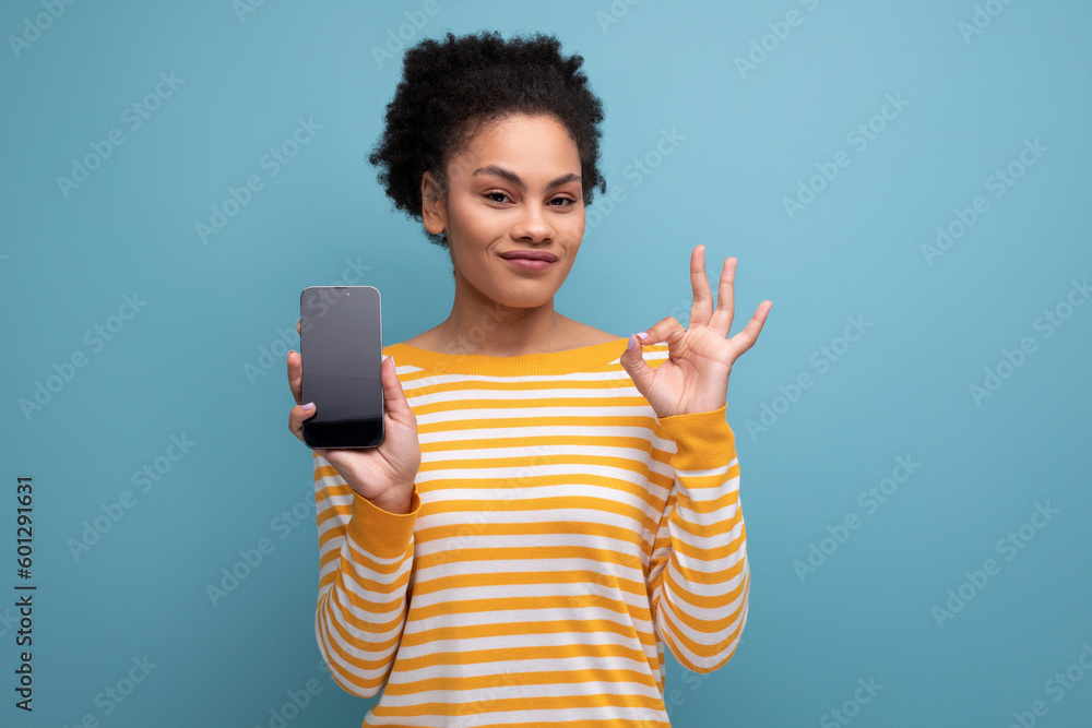 close up portrait of pretty brunette 20s latin young woman with ponytail with mobile phone mockup close up portrait of pretty brunette 20s latin young woman with ponytail with mobile phone mockup