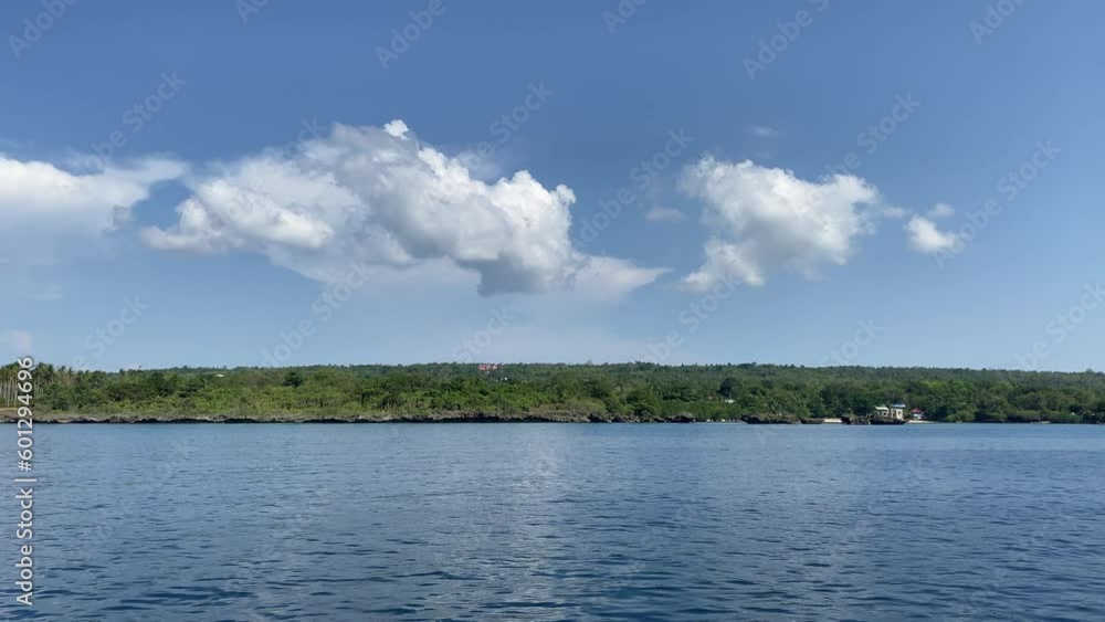 Small tropical island surrounded by crystal clear sea water. Camotes Small tropical island surrounded by crystal clear sea water. Camotes