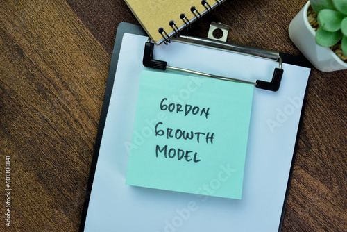 Canvas-taulu Concept of Gordon Growth Model write on sticky notes isolated on Wooden Table
