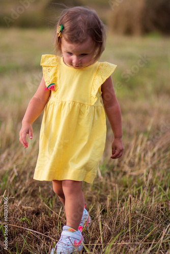 little girl in a field
