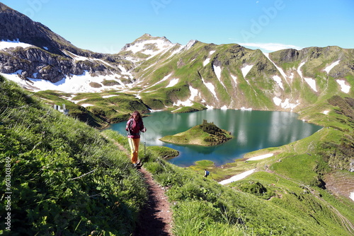 Woman hiking at Schrecksee in the Allgäu Alps