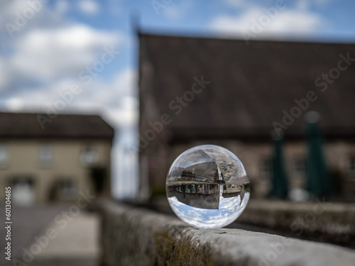 Obraz na plátně Crystal lens refractory ball in city