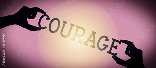 Tableau sur toile Courage - human hands holding black silhouette word