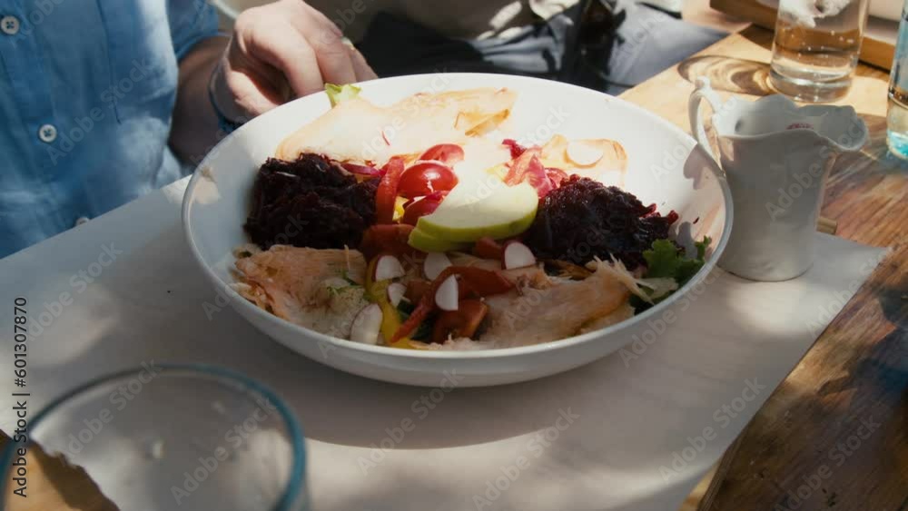 Plate of chicken salad served on a late afternoon Plate of chicken salad served on a late afternoon