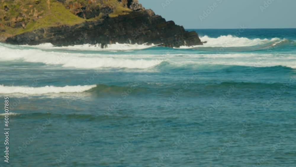Blue ocean with waves crashing into the shoreline in Africa Blue ocean with waves crashing into the shoreline in Africa
