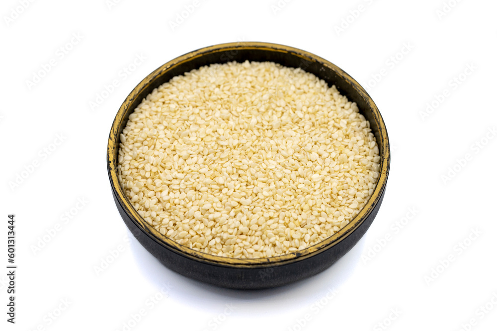 Sesame seeds. Organic White Sesame seeds (Sesamum indicum) isolated on white background Sesame seeds. Organic White Sesame seeds (Sesamum indicum) isolated on white background