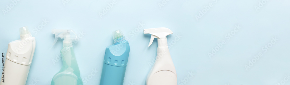 Banner Flat lay cleaning on a blue background. Cleaning tool mockup. Spray for cleanliness. Toilet cleaning bottle Banner Flat lay cleaning on a blue background. Cleaning tool mockup. Spray for cleanliness. Toilet cleaning bottle